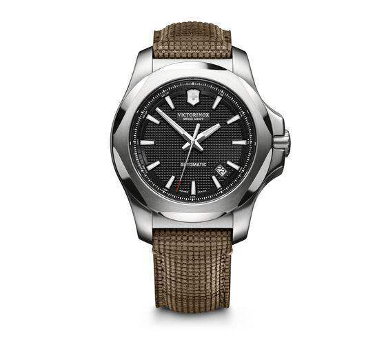 Victorinox I.N.O.X. Mechanical 241836 automatic watch with black textured dial, 43mm stainless steel case, and olive-green textile strap with protective bumper