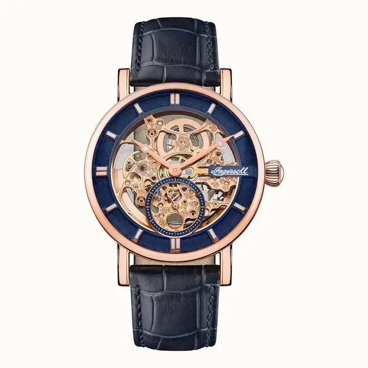 Ingersoll The Herald I00407B automatic skeleton watch with blue dial, rose gold PVD case, and navy leather strap