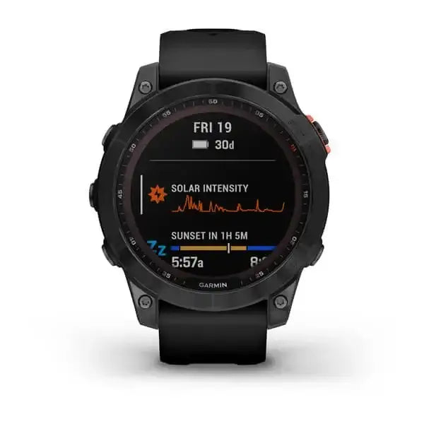 Garmin Fenix 7 Solar GPS adventure smartwatch with slate grey case, black silicone band, and solar charging Power Glass lens displaying solar intensity and sunset time