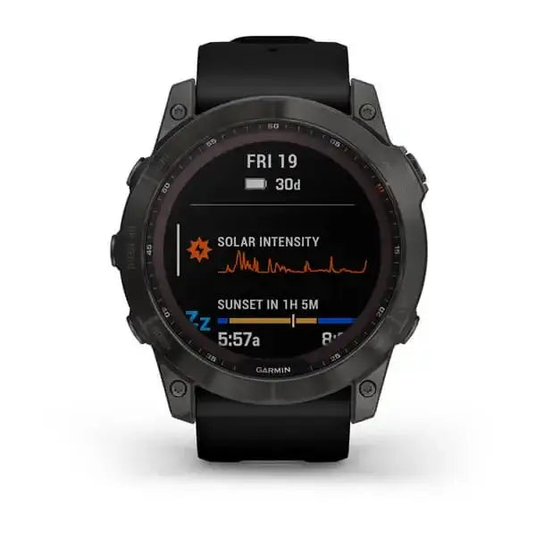 Garmin Fenix 7X Sapphire Solar Edition carbon grey DLC titanium multisport GPS smartwatch with black silicone strap showing solar intensity display